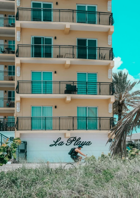 a surfer does an aerial trick on a surfboard