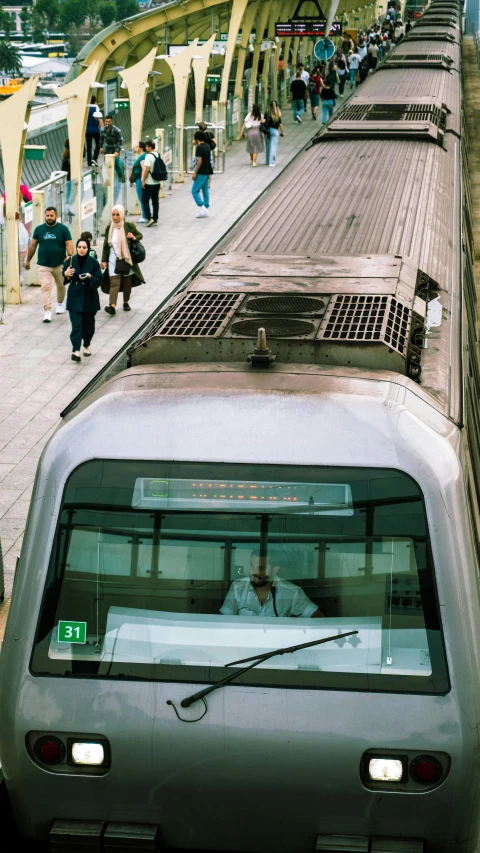 there is a train going down the tracks at this station