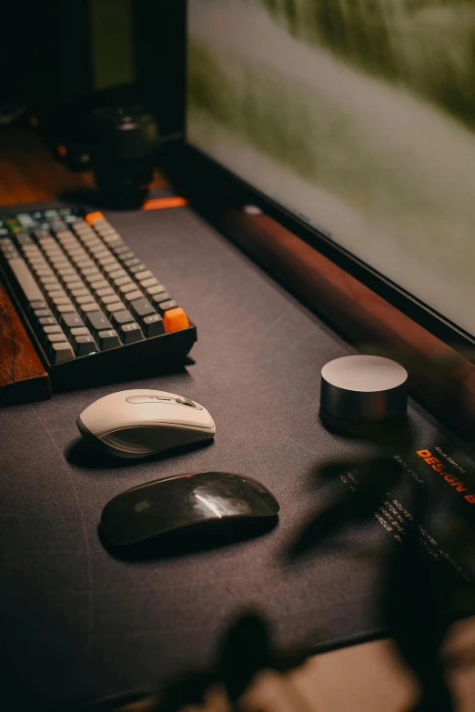 a mouse and keyboard on a table in a dark room