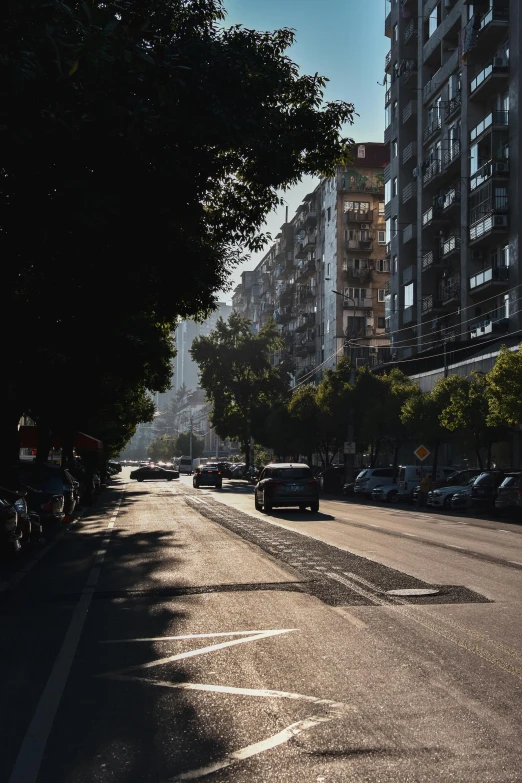 the street in the city is very empty with no cars