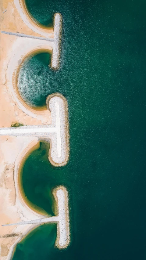 two piers extending into the water near one another