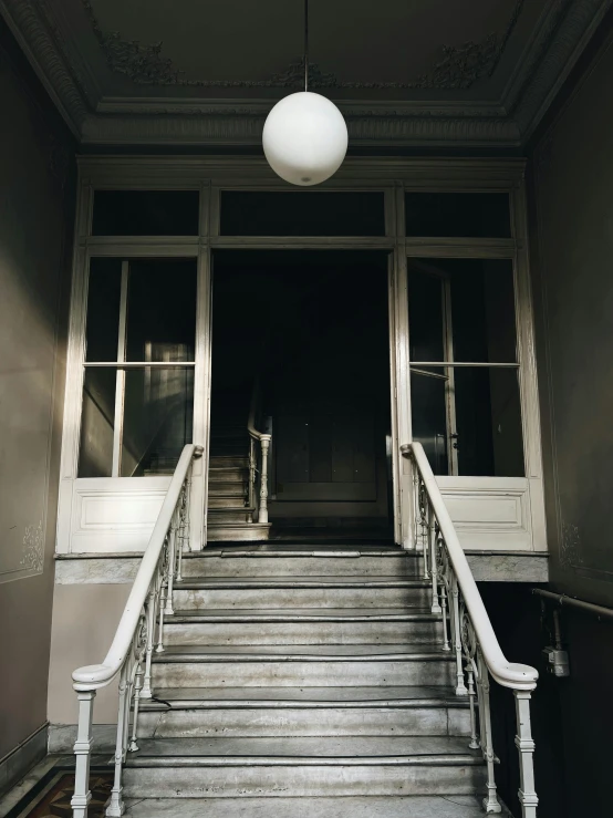 some large stairs leading to an outside room