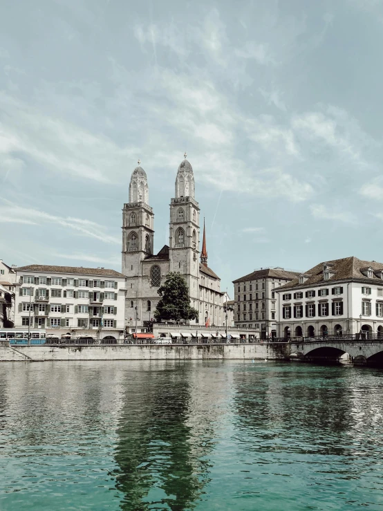 a view from across the water of some buildings