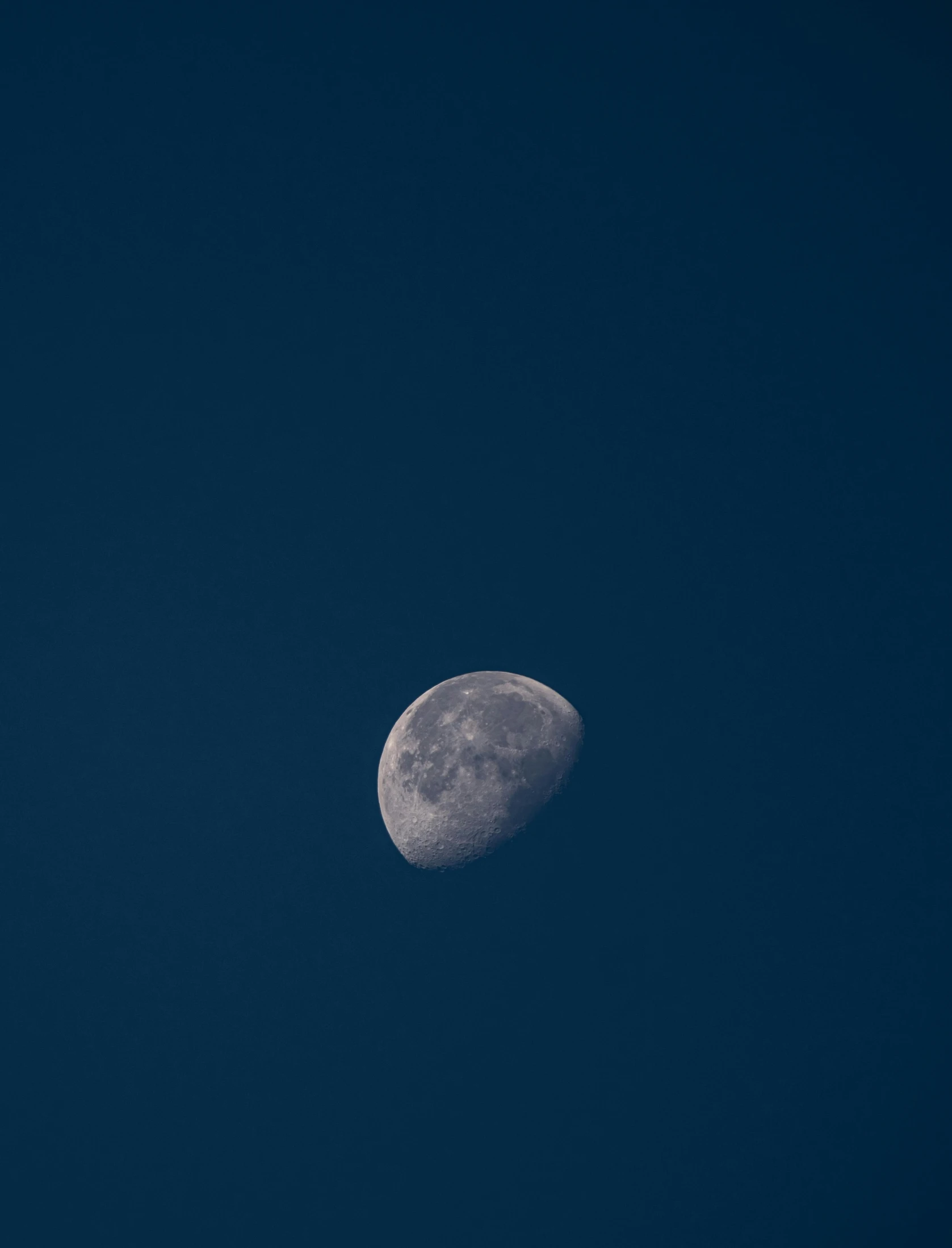 a full moon visible in the sky at night