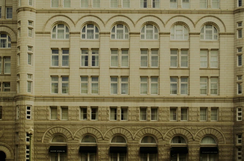 an old building with arched windows and a clock