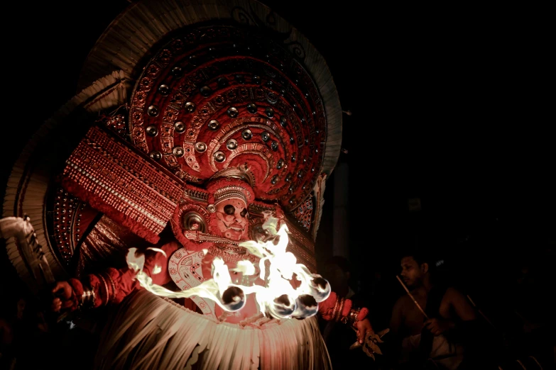 a man in a large costume that appears to be burning