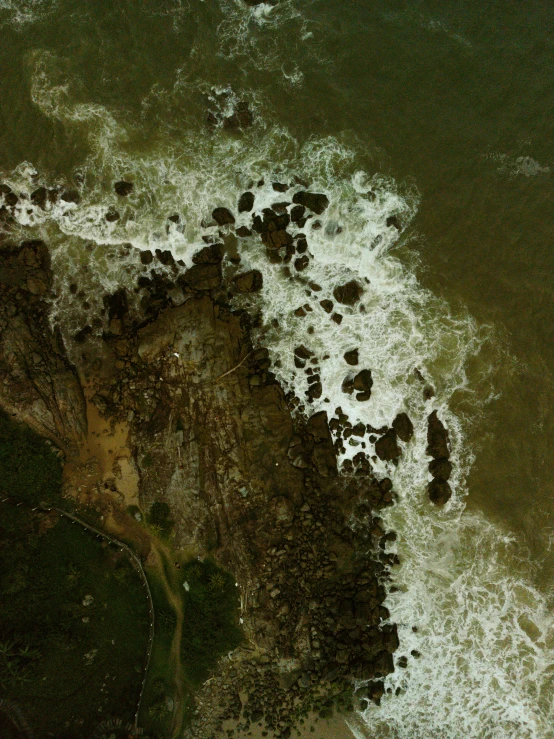 a view looking down on the water from a plane