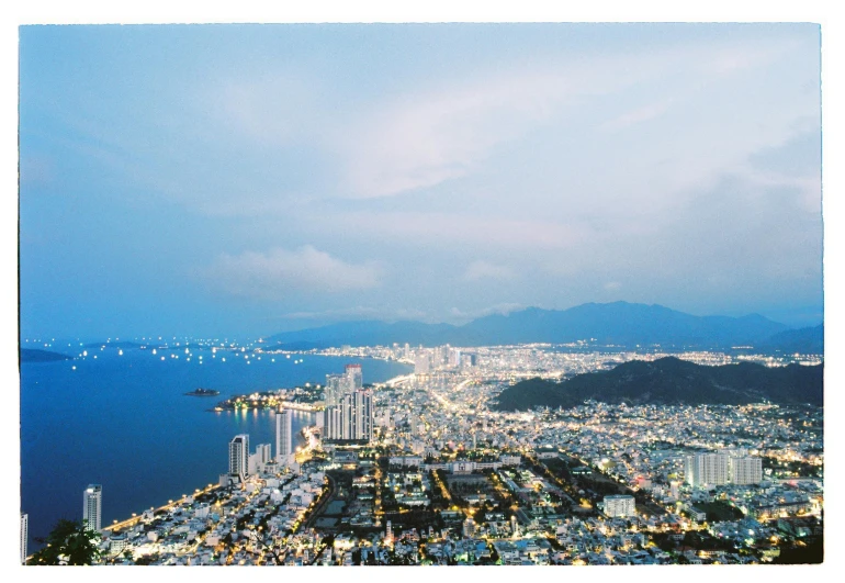 the view of a large city from above the city