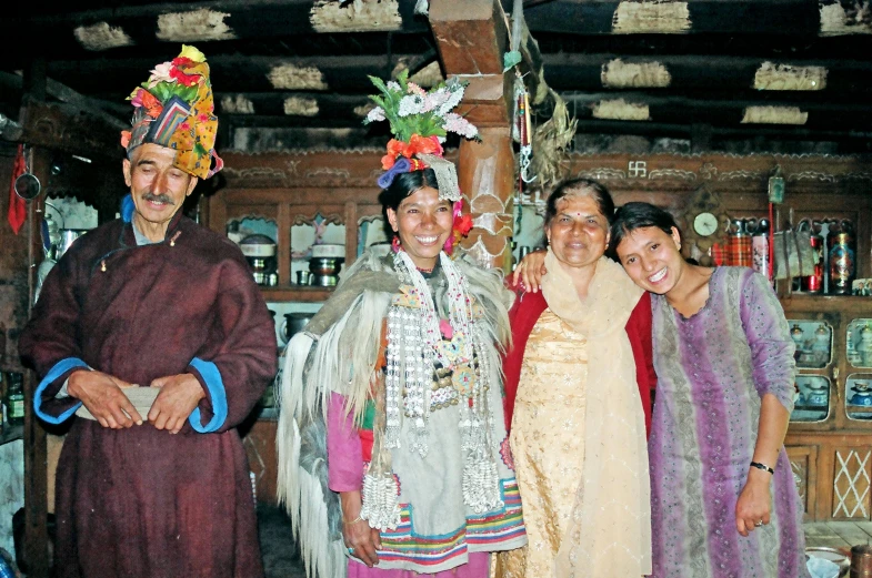 a group of women dressed in costume are posing for the camera
