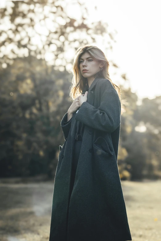 a woman posing for a po in the sun