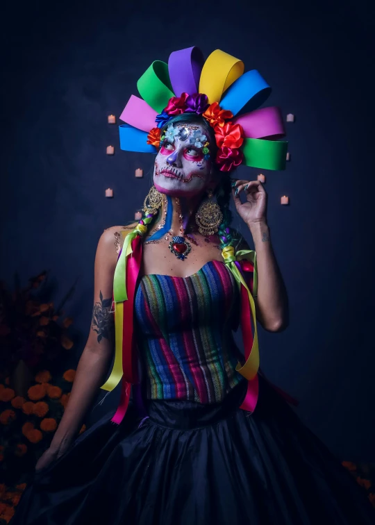 a woman with painted makeup and hair wearing a colorful dress