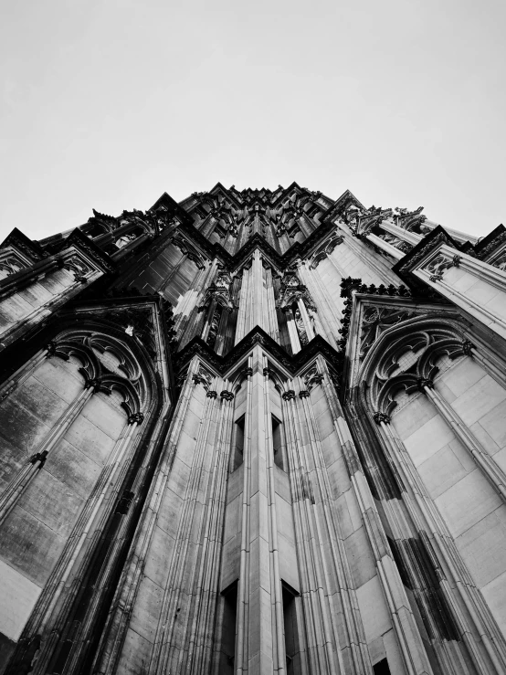 the very tall and ornate structure of a building is seen