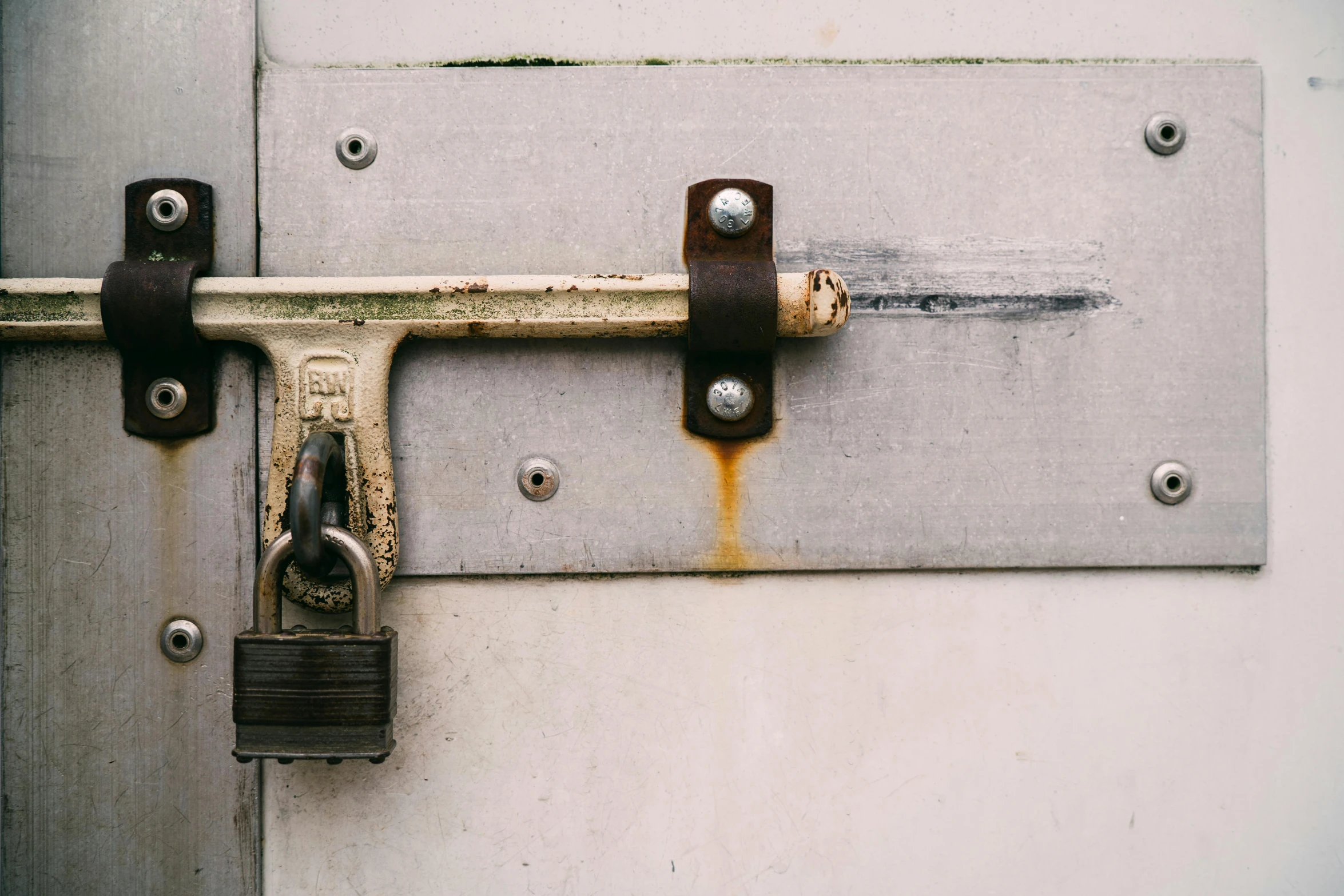 a lock and key on a door handle