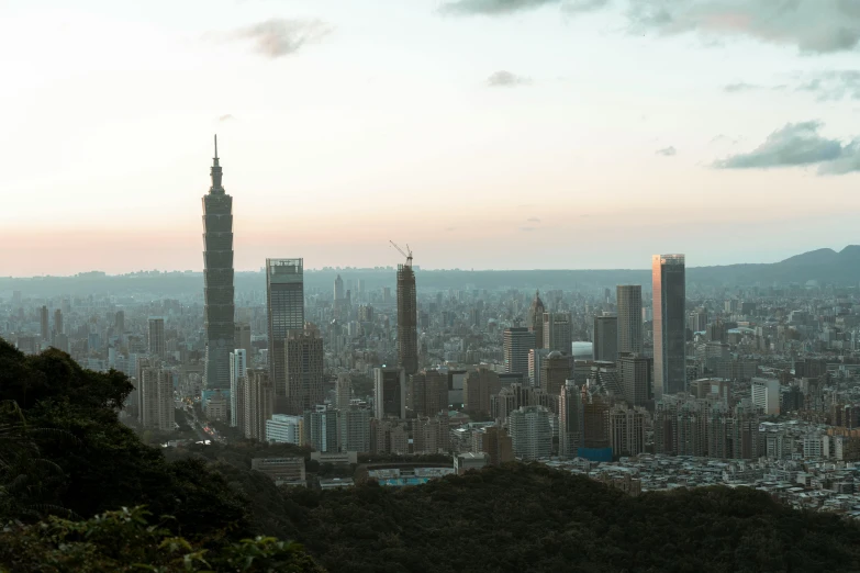 an aerial view of a city from the top of a hill