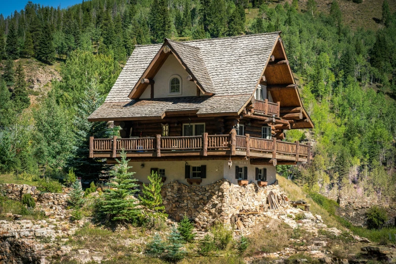 a large cabin with a very big balcony