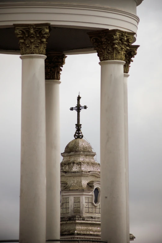 columns are shown surrounding a dome with crosses on it