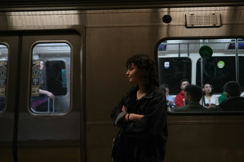 the person is waiting for the train in the subway