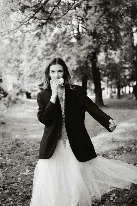 black and white po of a woman dressed in a wedding gown