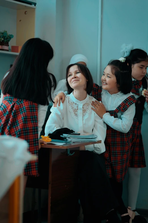 young women in a group having fun in their school