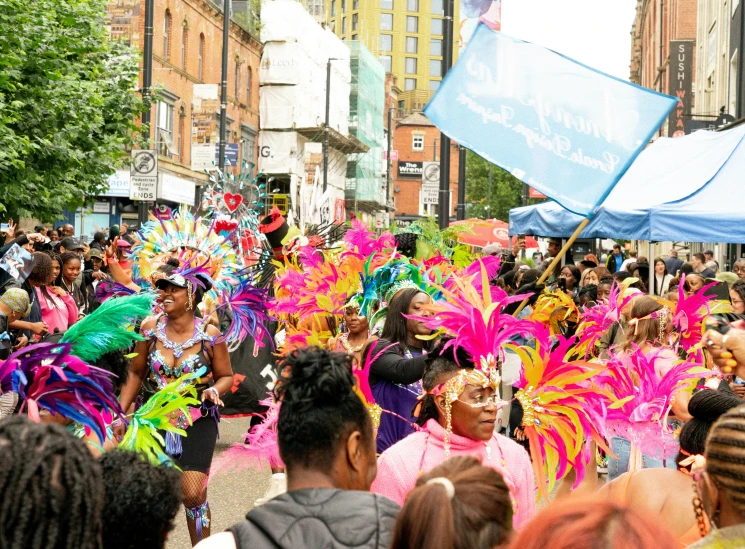 a group of people are standing around with masks on