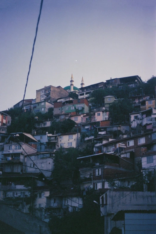 some very pretty buildings on top of some hills