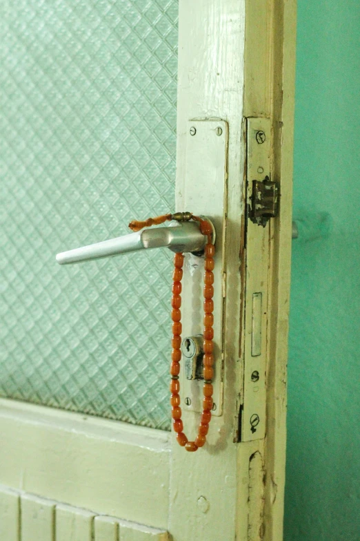 a door handle is shown on an open doorway