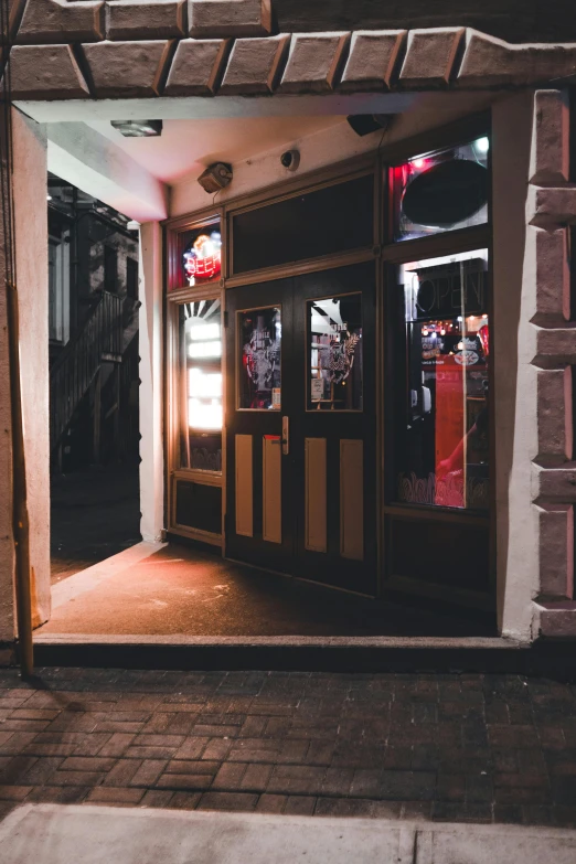 a brick building that has an entrance way to the store