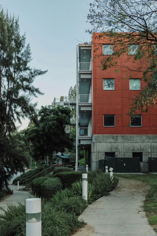 the tall building is made from an orange brick