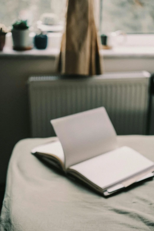 an open book is on top of a table