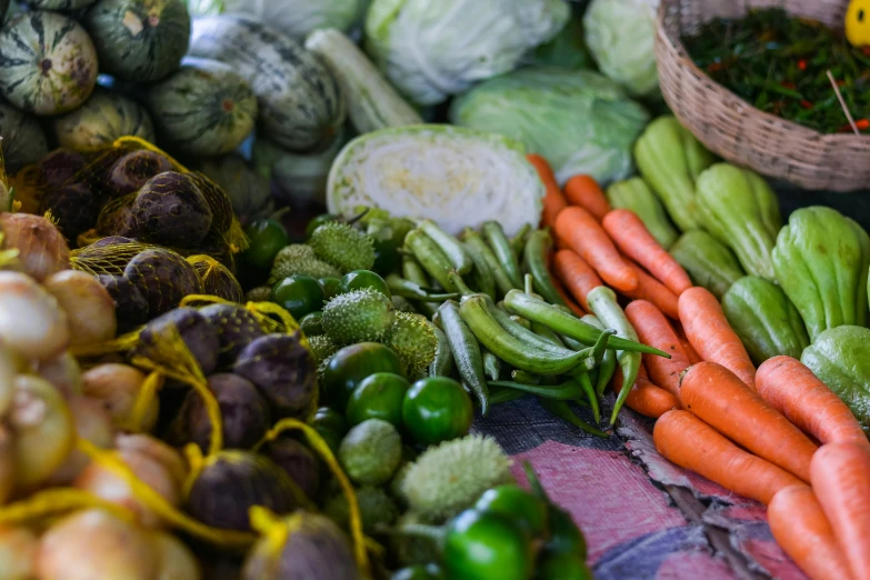 some vegetables and beans laying next to each other