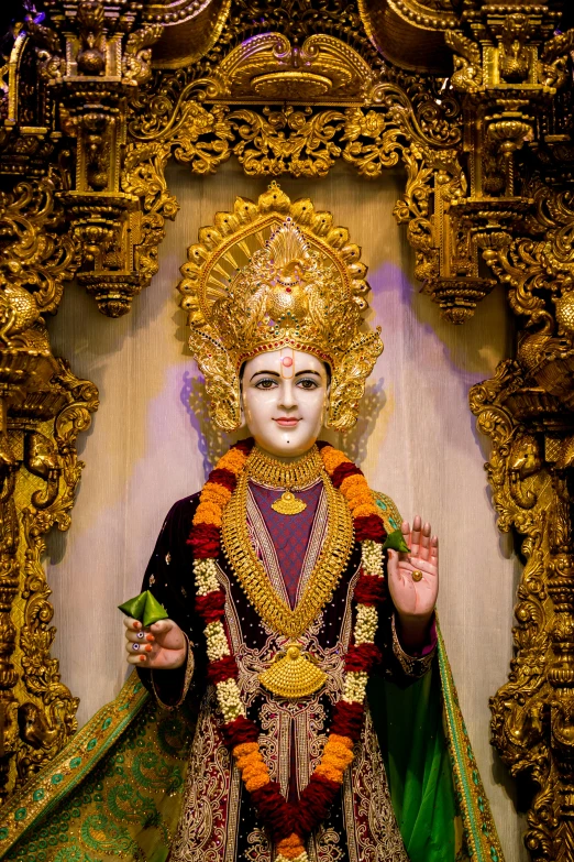 a man dressed as a hindu god