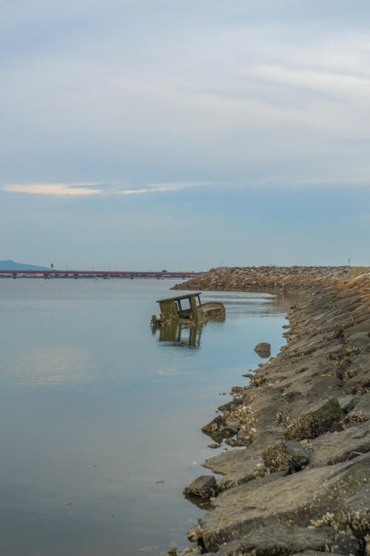 the blue and white waters on the shore of a large body of water