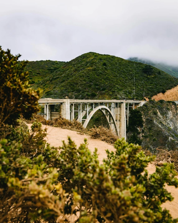 a very large bridge on a very big hill