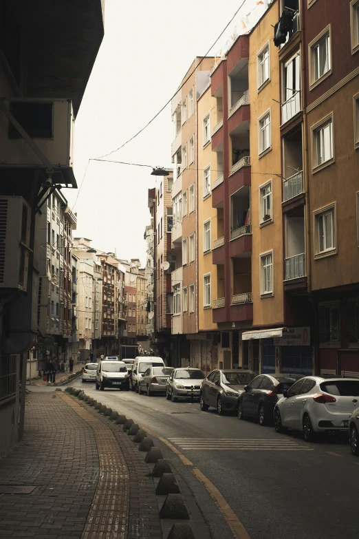 a city street filled with lots of tall buildings