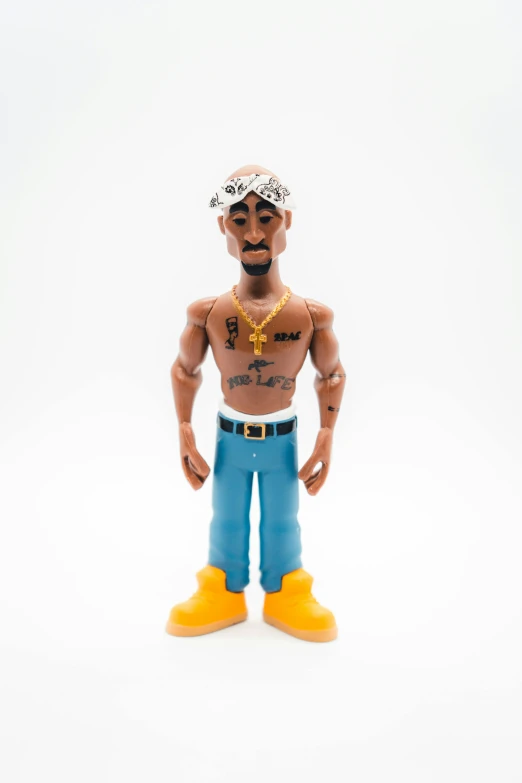 a figurine that is wearing a shirt and hat
