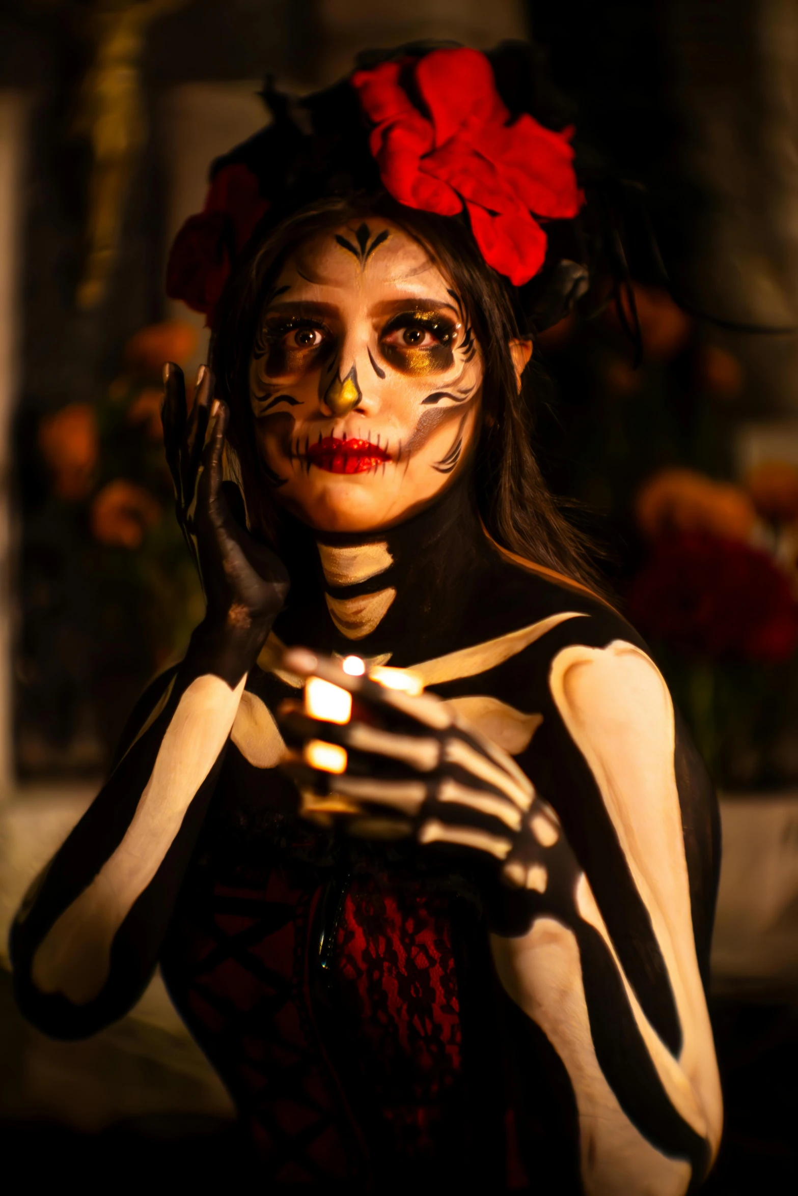 woman wearing day of the dead makeup and black dress