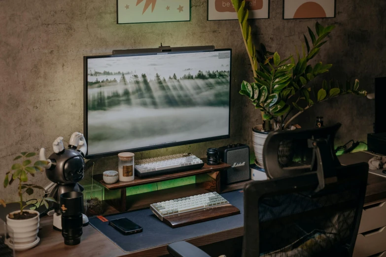 a computer desk with a large television on top of it