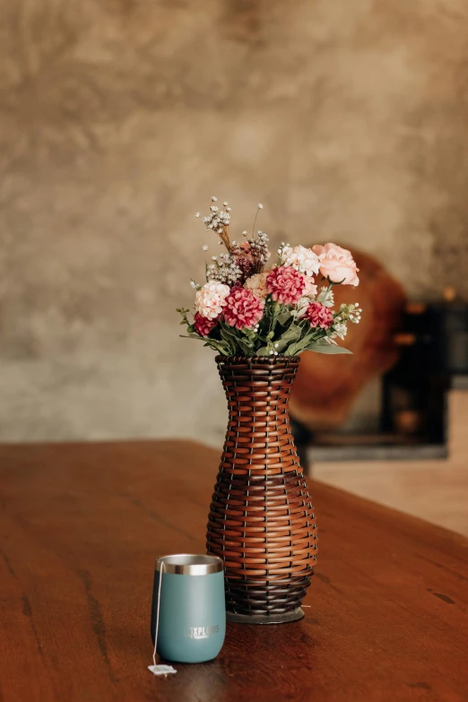 flowers in a vase sitting on a table