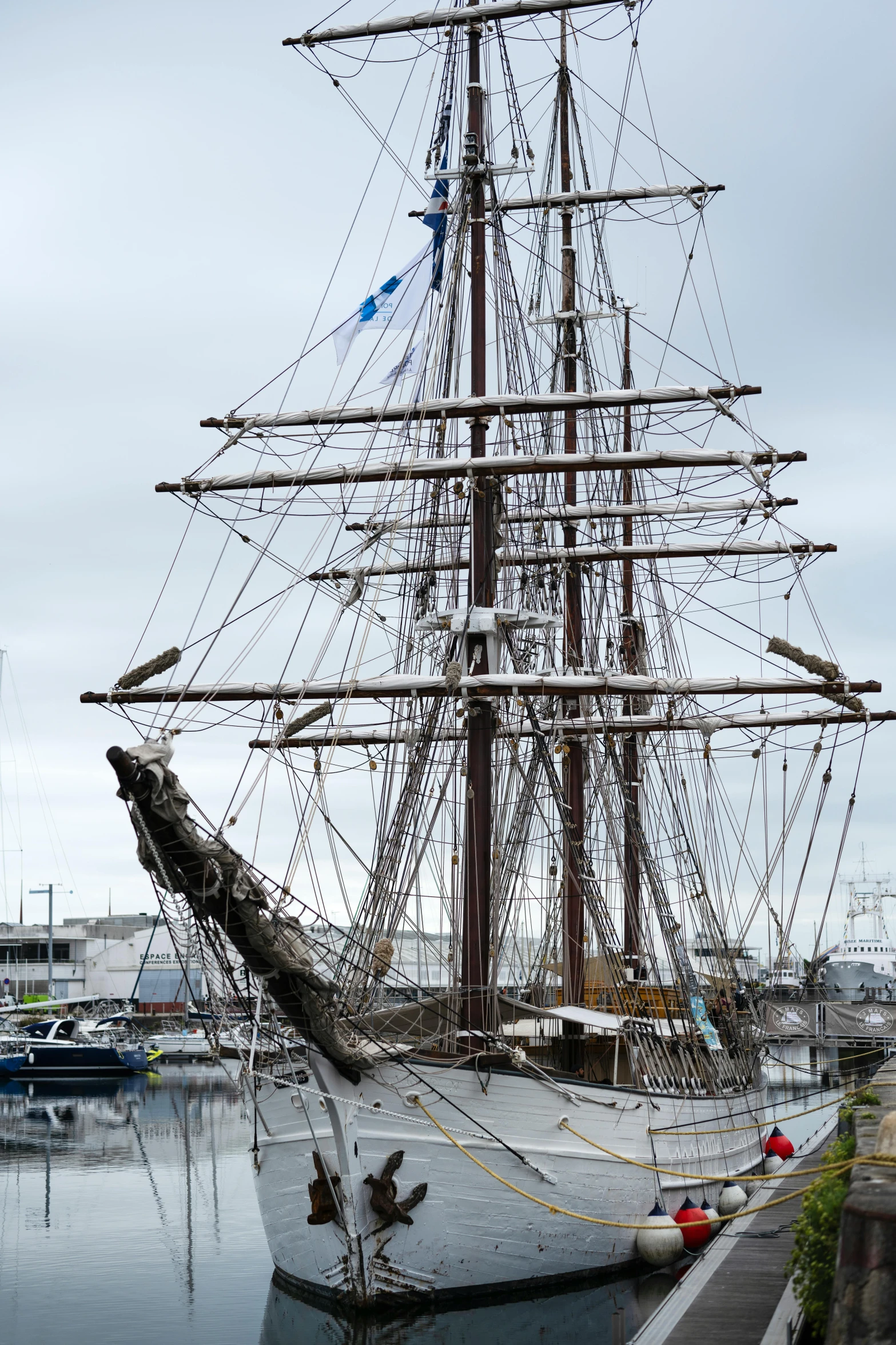 a very tall boat with lots of ropes tied to it