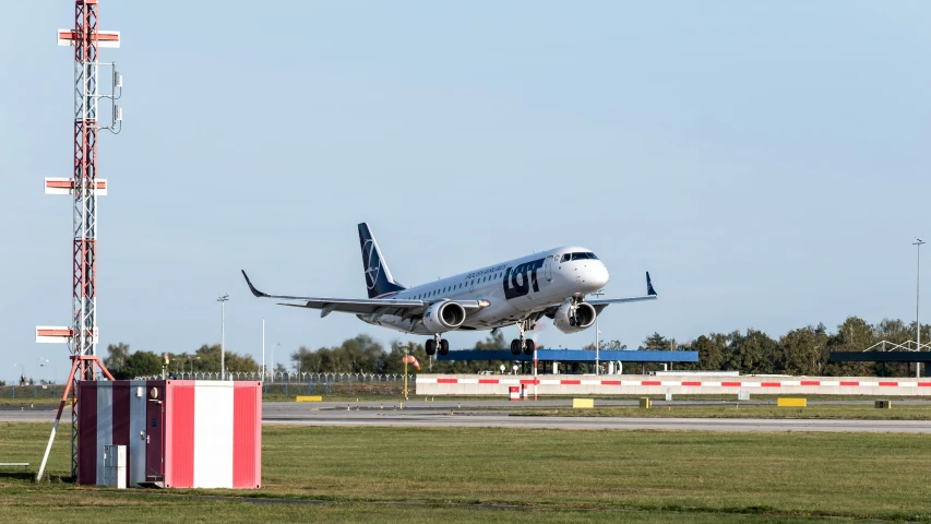 a plane taking off from an airport runway