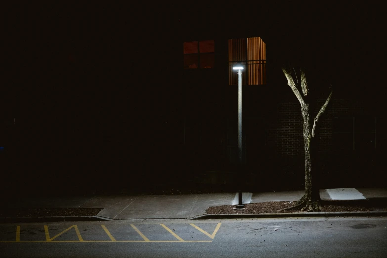 a street light shining in the dark