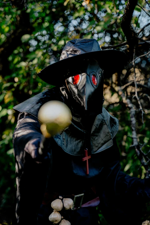 a person wearing a black suit and red eyes