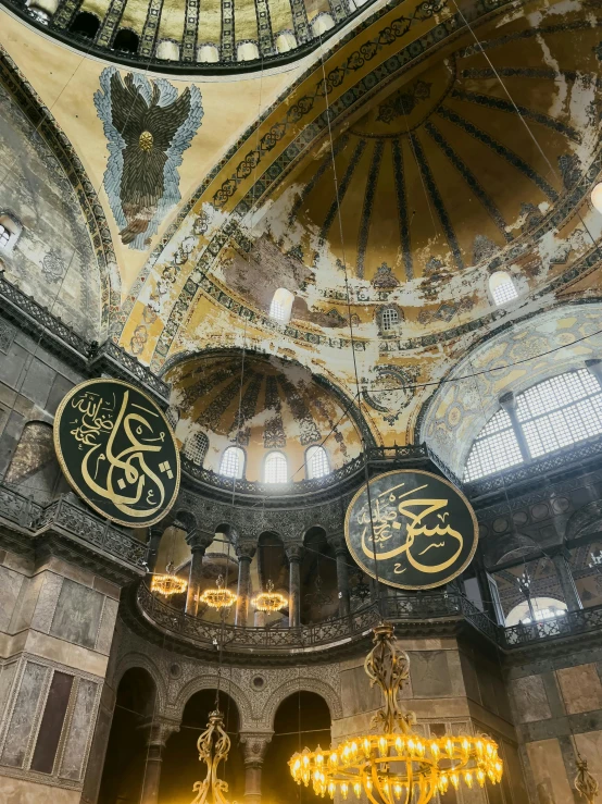 the ceiling of the old building with a chandelier