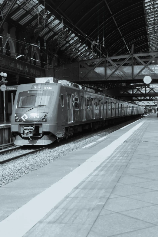 a commuter train parked in the train station