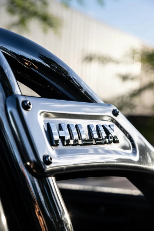 a close up of the handlebars on a black motorcycle