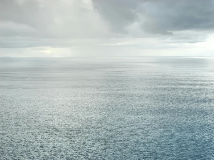 two boats that are on a body of water