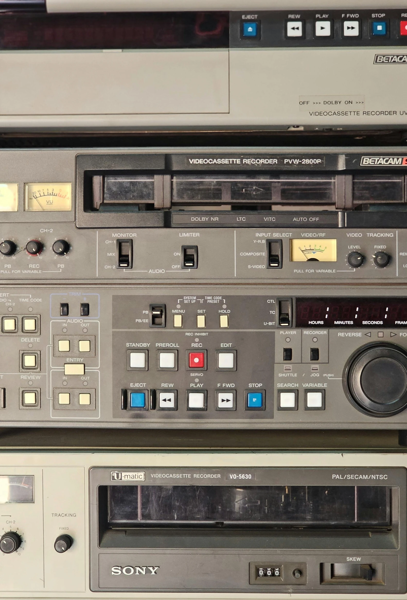 electronic equipment mounted on the wall next to each other