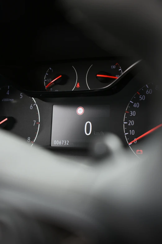 the dashboard of an automobile with digital numbers displayed