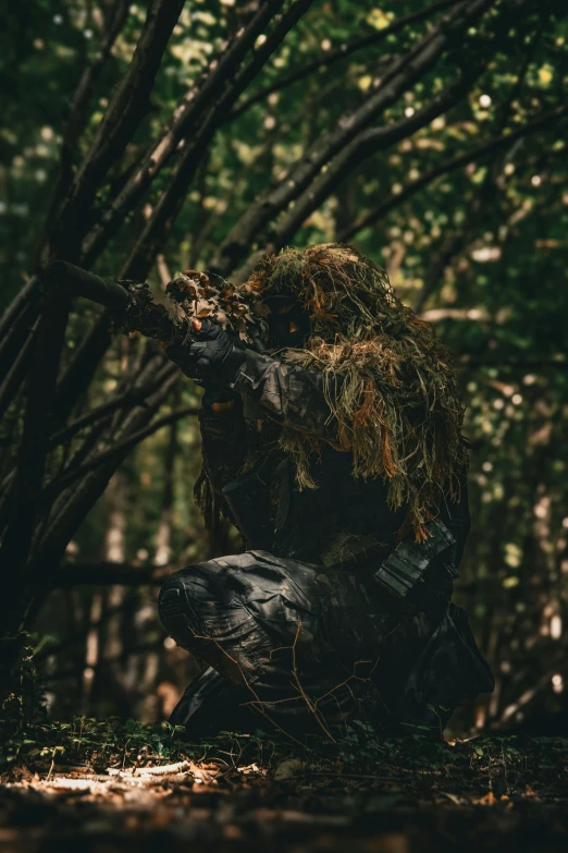 a close up of a human made sculpture in the woods