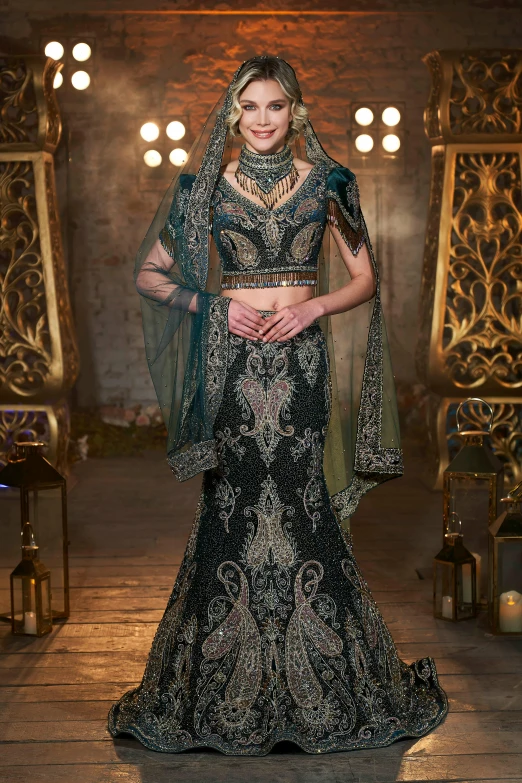 a model in an oriental inspired outfit on the runway